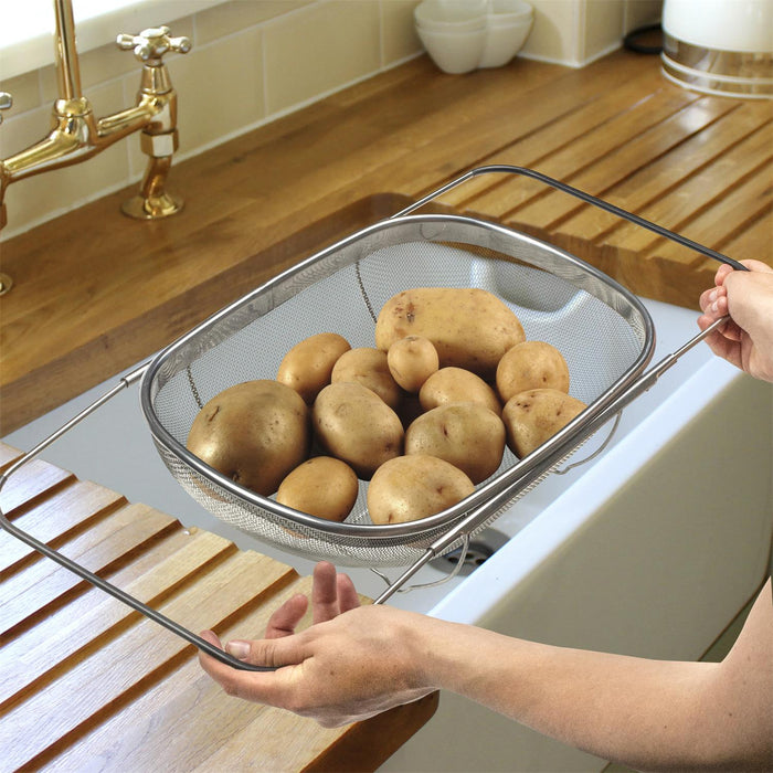 SIEVE WITH EXTENDING HANDLES